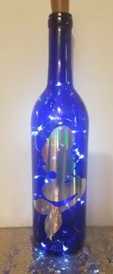 Mermaid decal on blue wine bottle with choice of white/color fairy cork lights