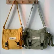 Lettering Canvas Messenger Bag Black + Doll - One Size