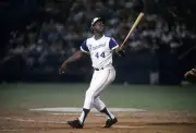 Outfielder Hank Aaron Atlanta Braves swings and fouls a ball out - 1974 Photo