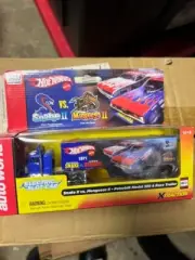 Snake II vs Mongoose II Auto World Racing Rigs Xtraction Peterbilt Model 359