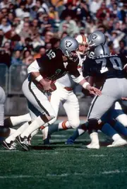 Quarterback Ken Stabler Oakland Raiders drops back to pass v the - 1974 Photo 2