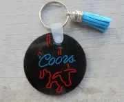 COORS BEER RODEO/BULL RIDER W/TASSLE key chain