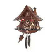 One Day Cuckoo Clock Cottage with Man Chopping Wood