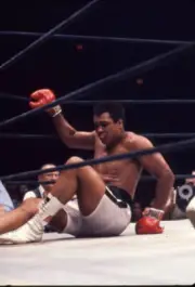 Muhammad Ali in action on the canvas after getting knocked down vs- Old Photo