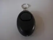 1x Portable mini panic button personal torch alarm-loud 125 DB siren {Black}