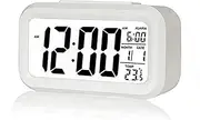 Poeroa Digital Alarm Clock,Battery Operated Small Desk Clocks,with Date,Indoor Temperature,Smart Night Light,LCD Electronic Clock for Bedroom Home Office - White