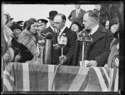 English aviatrix Amy Johnson approaching press microphones through - Old Photo