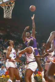 Armen Gilliam Phoenix Suns shoots over John Williams and C Basketball 1988 Photo