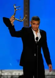 Actor George Clooney accepts award onstage at Spike TV's 4th "Guys- Old Photo 8