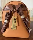 Brown Leather Backpack with Golden Bee Charm - Stylish and Functional Travel Bag