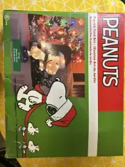 Peanuts Pre-Lit Yard Art 24” Tall Snoopy Skating