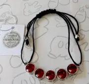 Swarovski Dark Red Crystal Bracelet Signed STS Karis Silver Tone Black Bolo Cord