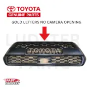 16-23 TOYOTA TACOMA TRAIL EDITION GRILLE BLACK W/BRONZE GOLD LETTERS GENUINE OEM (for: Toyota)