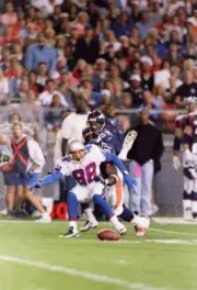 Wide receiver Terry Glenn New England Patriots is striped football- Old Photo