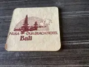 ANKER Bir “ Nusa Dua Beach Hotel Bali “ BEER Coaster DAMAGED one side.