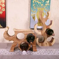 在飛比找樂天市場購物網優惠-泰國實木創意大象造型紅酒架中式復古風格桌面葡萄酒架擺件多瓶