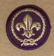 NEW OLD STOCK VINTAGE PATCH 1.75 ROUND PURPLE WREATH