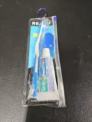 REACH Travel Kit Toothbrush With Cap And Toothpaste 0.85 Oz