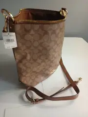 Coach NEW Abby Duffle in Signature canvas w/tags.