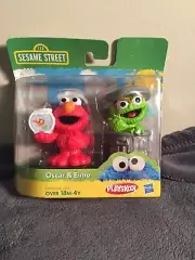 New Sesame Street figures Elmo and Oscar the Grouch set