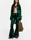 H&M The White Lotus PATTERNED RUFFLE-TRIMMED PANTS Size 8 Green Black NEW