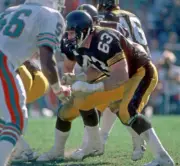 Offensive lineman Pete Rostosky Pittsburgh Steelers blocks against- Old Photo 1