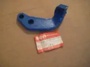 SUZUKI DR100 FRONT FOOTREST BAR MOUNT BRACKET NOS!