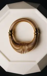 [ALAÏA] Gold-Tone Spiral Bracelet