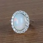 4 Ct. Natural Oval Shape Fire Opal & White Accents Solitaire Ring in 925 Silver