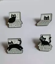 black and white cat on/in laptop computer - each sold separately