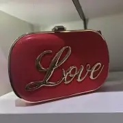 New with tags ALDO Women's Red Loverania crossbody clutch bag chain strap love