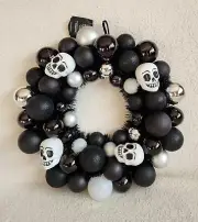New Target 16in Halloween wreath with skulls black and white, shatterproof