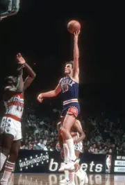 Don Buse Phoenix Suns shoots over Elvin Hayes Washington Bullets a- Old Photo