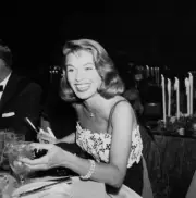 Actress Joanne Dru attends a Stanley Kramer dinner party in LA 1957 Photo 2
