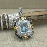 Sterling Silver & 10K Trinity Knot Celestial Pendant Blue Topaz by Keith Jack