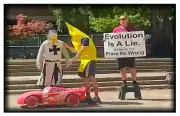 Magnet #576 Evolution Is A Lie Prove Me Wrong Weird Street Art Performance Meme