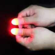 2pcs Red Super Bright Light Up Thumb Trick Appearing Light Close Up Funny Toy
