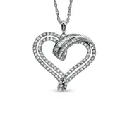 0.33 CT. T.W. Round and Baguette Natural Diamond Heart Pendant in Sterling Silver
