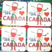 Sealed NIP Set Of Four WE LOVE CANADA Hockey Lumberjack Cork Backed Coasters