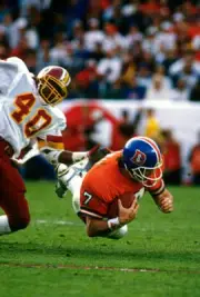 John Elway Denver Broncos gets tackled by Alvin Watson Washi Football 1988 Photo