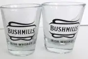 BUSHMILLS IRISH WHISKEY SHOT GLASSES NEW SET of 2 CLEAR w/BLACK GRAPHICS
