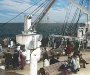 Titanic sister ship RMS Olympic arrives in NYC with steerage passengers on deck