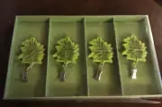4 Green Leaf Shaped Tablecloth Weights Clamps New in Box