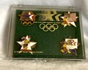 New 1984 Olympic 4 Pin Sam The Eagle Torch Flag & Olympic Rings Set