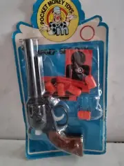 Vintage Gun . Never taken out of orginal packet