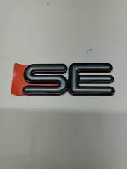 1990 To 1996 Pontiac Trans Sport (SE) Emblem Grey Over Black NEW OEM Stock