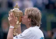 Stefan Edberg of Sweden kissing the trophy after defeating Boris - Old Photo