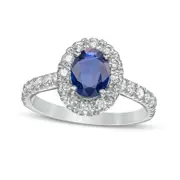 Oval Blue Sapphire and 0.63 CT. T.W. Natural Diamond Frame Ring in Solid 14K White Gold