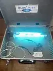 Fresh-Aire™ 16" Blue Tube TUVL-100 UV Replacement Bulb set up in metal case