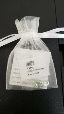 Touchstone By Swarovski Charm in Peridot. New in bag